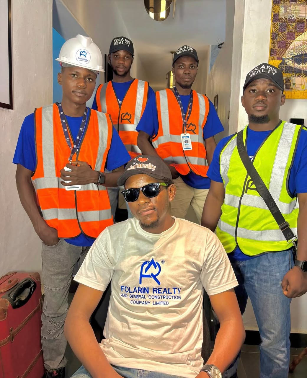 The Folarin Realty & General Construction team on-site in branded safety gear